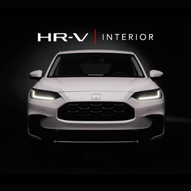 2027 Honda HR-V EX-L in Platinum White Pearl three quarter view in with Interior text (Subcompact Crossover SUV).